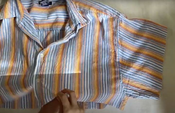 diy button up shirt refashion turn a shirt into a cute ruffle top, Cutting the sleeves