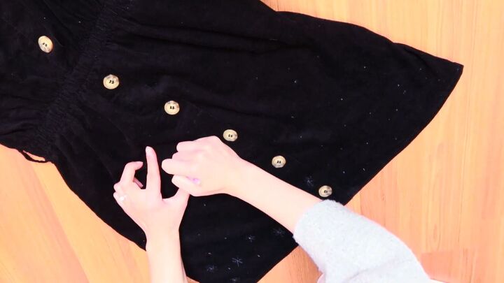 upstyling a plain black dress with adorable embroidered daisies, Marking the daisy placement