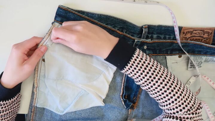 how to downsize jeans fix a broken zipper mend your clothes, Pinning the jeans