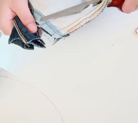 how to downsize jeans fix a broken zipper mend your clothes, Trimming the excess fabric