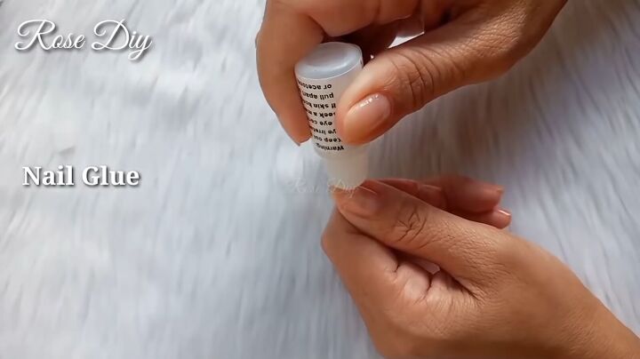 how to make fake nails with toilet paper baby powder, Applying nail glue to the nail