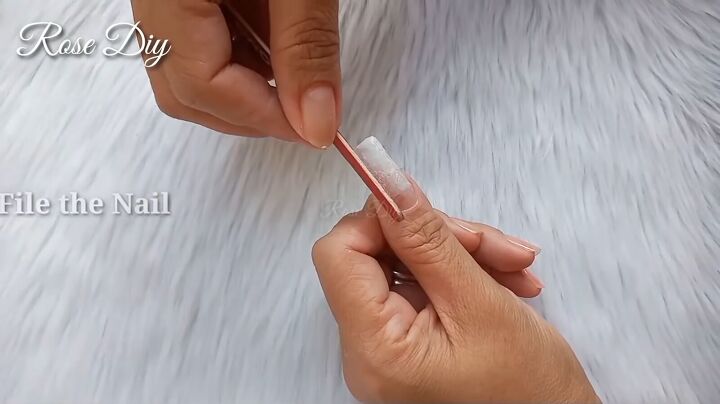 how to make fake nails with toilet paper baby powder, Filing the nail