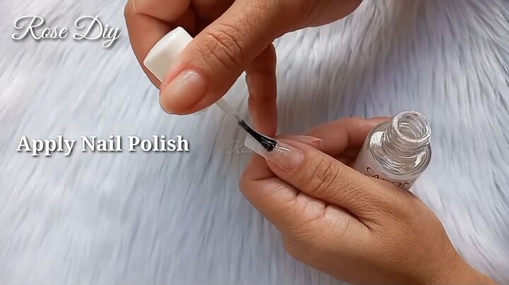 how to make fake nails with toilet paper baby powder, Applying clear nail polish