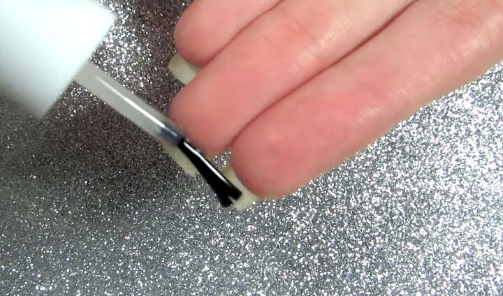 how to prevent peeling nails 7 tips tricks you need to know, Applying cuticle oil all over nails