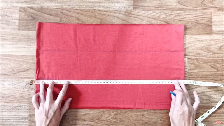 how to make a gorgeous diy wrap dress out of 2 t shirts, Measuring the width of the fabric