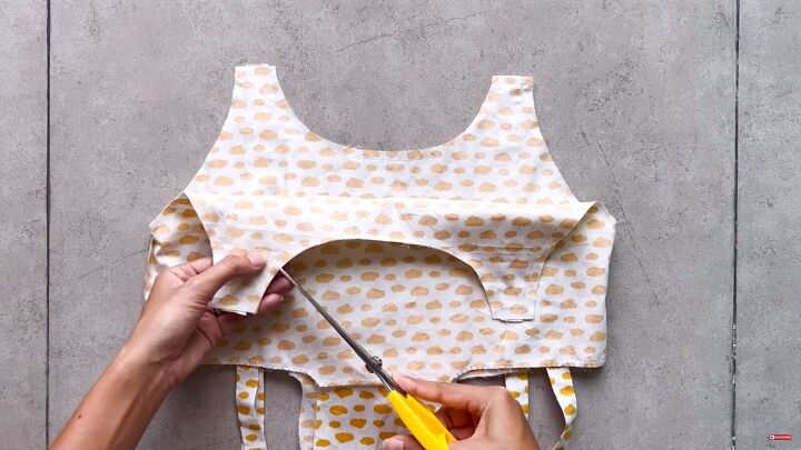 how to sew a super cute summery diy babydoll dress, Snipping the curved neckline