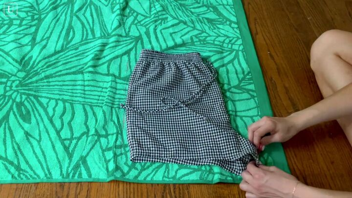 how to sew shorts a matching a tote using an old beach towel, Tracing the shorts pattern