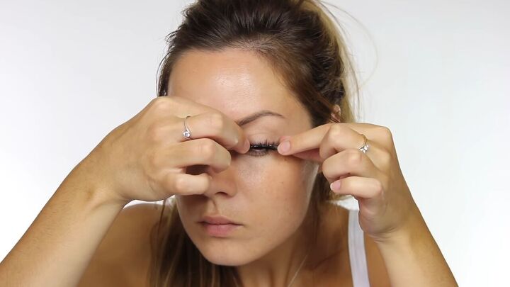 try this soft light summer makeup without foundation, Applying false lashes
