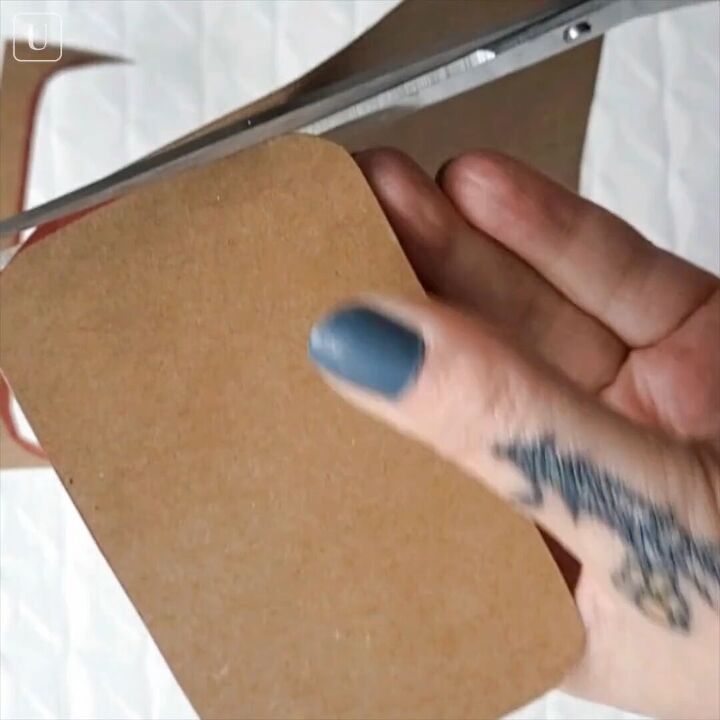how to make a diy small jewelry box out of an old mint tin, Cutting out the traced shape