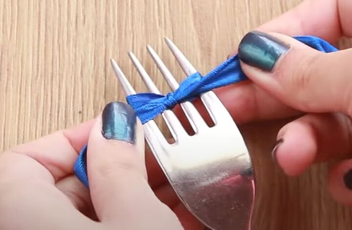 how to make dainty diy pearl bow earrings using a dinner fork, Making a bow on a fork