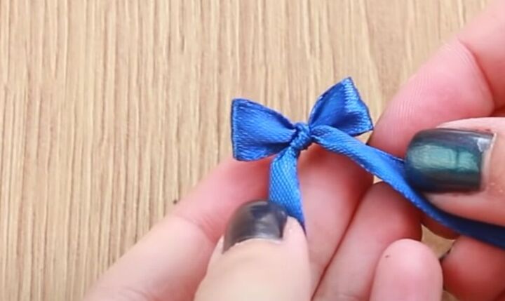 how to make dainty diy pearl bow earrings using a dinner fork, Miniature bow