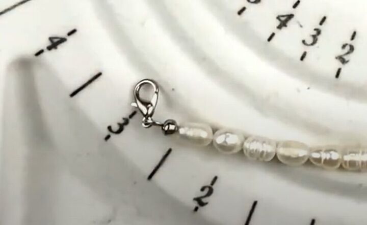 how to use old necklaces to make a pretty diy pearl chain bracelet, Finishing the DIY bracelet