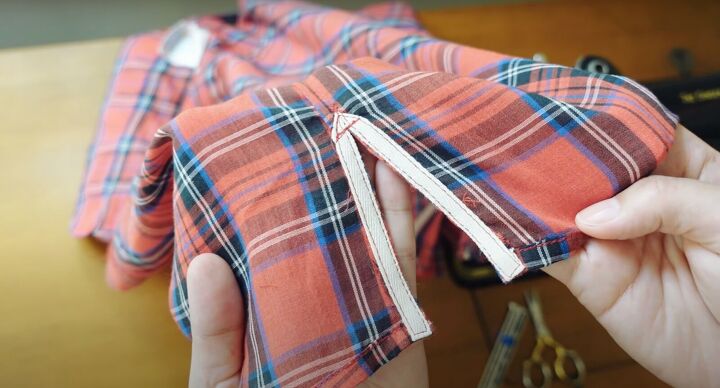 how to upcycle a men s shirt into a feminine top, Adding small vents at the bottom