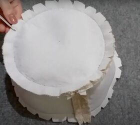 how to make a diy bucket hat without a sewing machine, Cutting notches along the seam allowance of the circle
