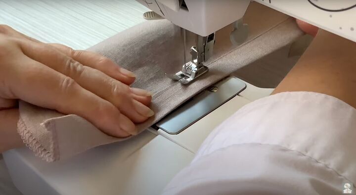 how to sew an a line dress with pockets in a few simple steps, Topstitching the pockets