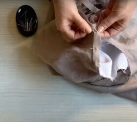 how to sew an a line dress with pockets in a few simple steps, Pinning the bias strips to the armholes