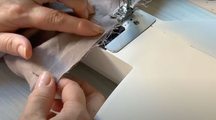 how to sew an a line dress with pockets in a few simple steps, Sewing the bias strip down
