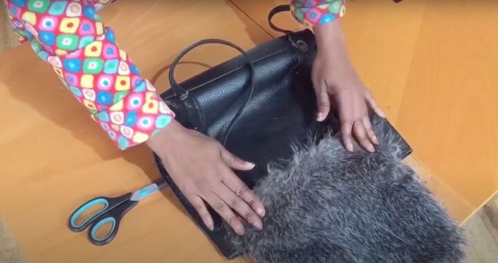 how to upcycle an old tote bag into a cute diy backpack, Sticking the fur flap to the backpack