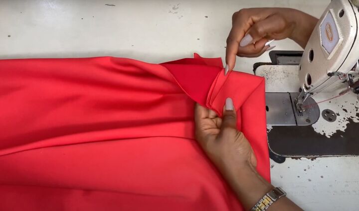 how to make a pencil skirt with a front slit, Pushing the seam allowance down
