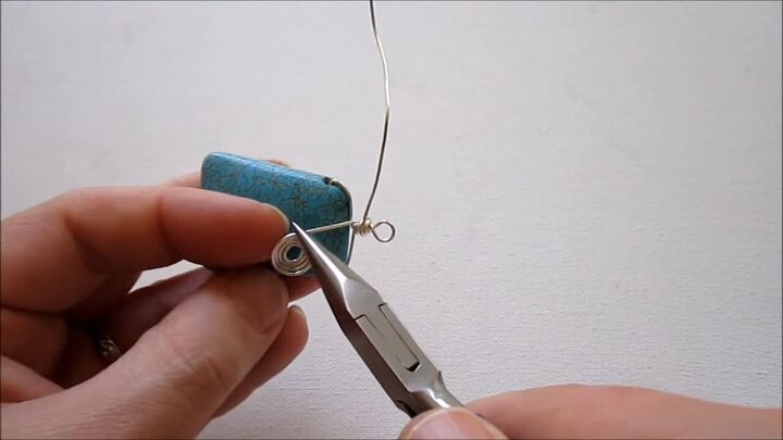 easy steps to make your own gorgeous wire spiral and bead pendant, Bending the wire spiral so it comes straight down