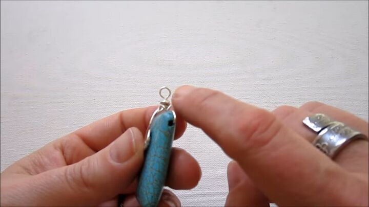 easy steps to make your own gorgeous wire spiral and bead pendant, Loop twisted to opposite direction of pendant