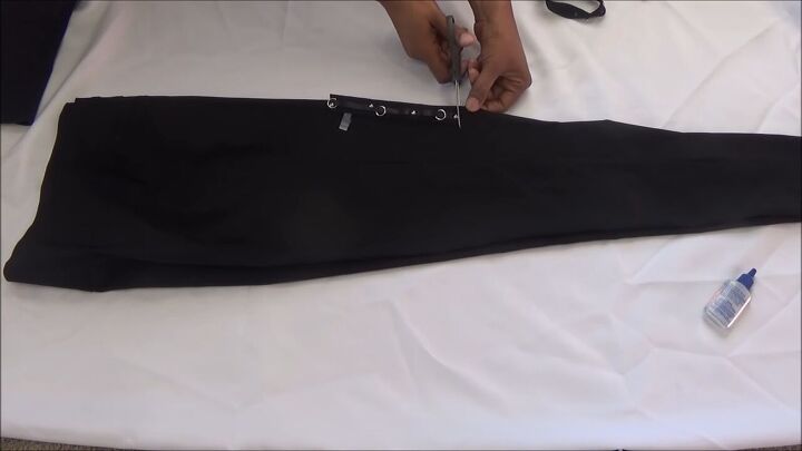 make your own trendy lace up pants, Cutting a slit where the opening of pants will be