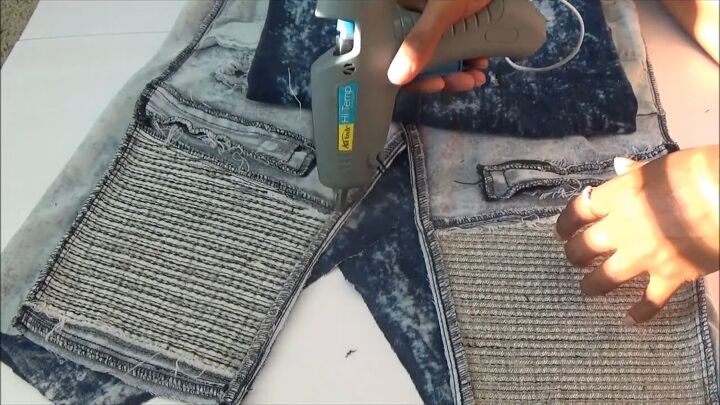 how to quickly turn your old distressed jeans into a stylish skirt, Gluing on cut pieces of jeans over open spaces