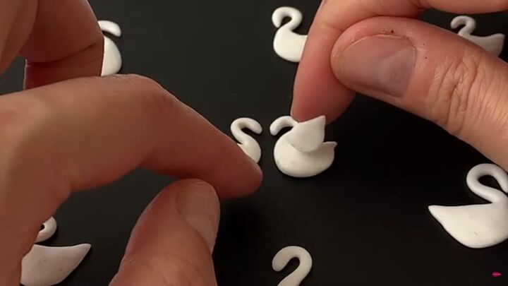 how to make polymer clay earrings inspired by swan lake, Placing the wings on the swan s body