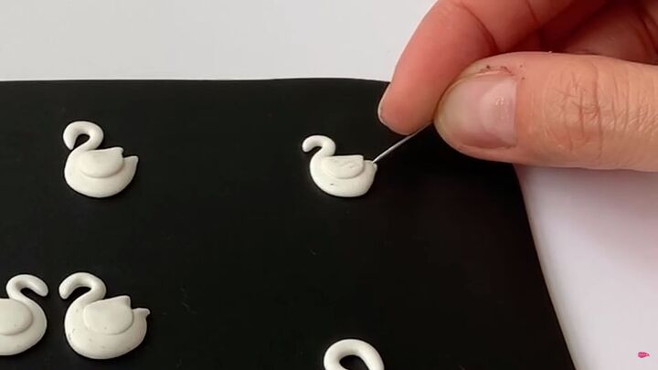how to make polymer clay earrings inspired by swan lake, Adding detail with a pin