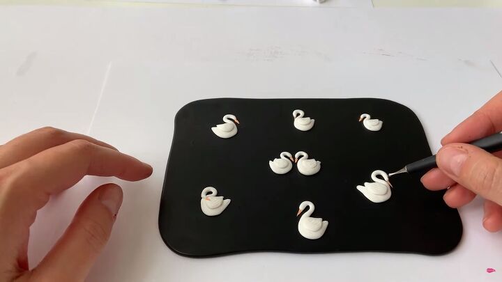 how to make polymer clay earrings inspired by swan lake, Adding detail to the swans