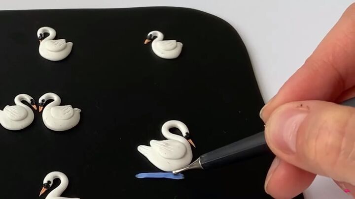 how to make polymer clay earrings inspired by swan lake, Placing the water ripples under the swans