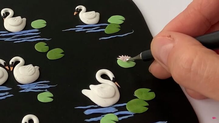 how to make polymer clay earrings inspired by swan lake, Placing lily petals on the lilypads