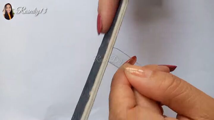 how to make diy plastic nails out of a soda bottle, Filing the plastic nail