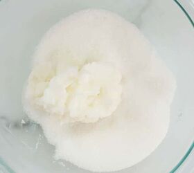 Pour sugar into a bowl for this tropical and luxurious self-care idea (you're worth it!)