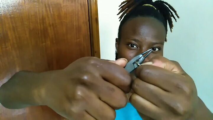 creative ways to fake piercings at home and change your look daily, Opening the large jump ring with a plier