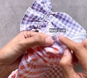 how to make a cute diy patchwork dress out of gingham scraps, Pinning the side piece to the sleeve s end