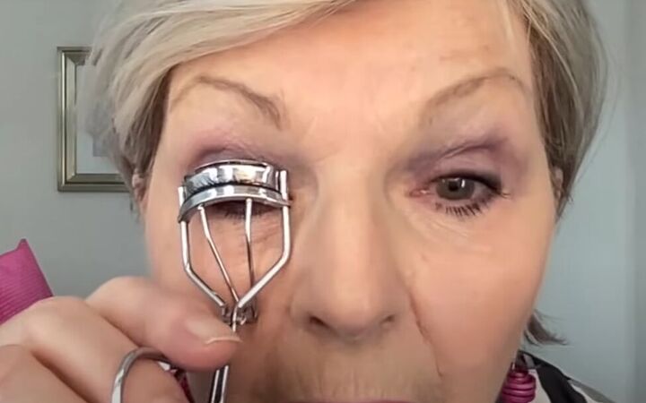 how to curl lashes use eyelash curlers for older women, Trapping lashes between the clamps