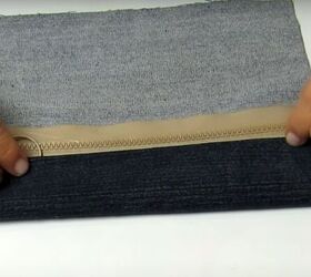 how to make a cute handmade makeup bag out of old denim, Attaching the zipper with hot glue
