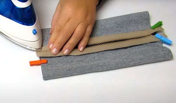 how to make a cute handmade makeup bag out of old denim, Ironing the seams