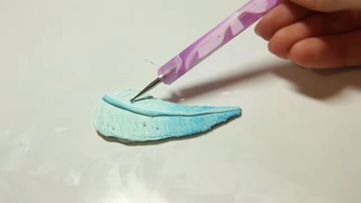 easy instructions for a gorgeous ombre feather charm with polymer clay, Using a dotting tool to create texture and blend