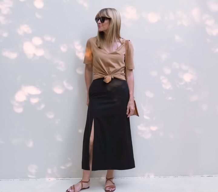 how to look chic in hot weather 9 classic summer clothing items, Wearing a midi skirt with a slit in the summer