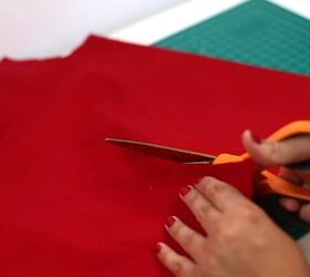 how to make a diy devil horn hat in a few simple steps, Cutting out the red fabric pieces