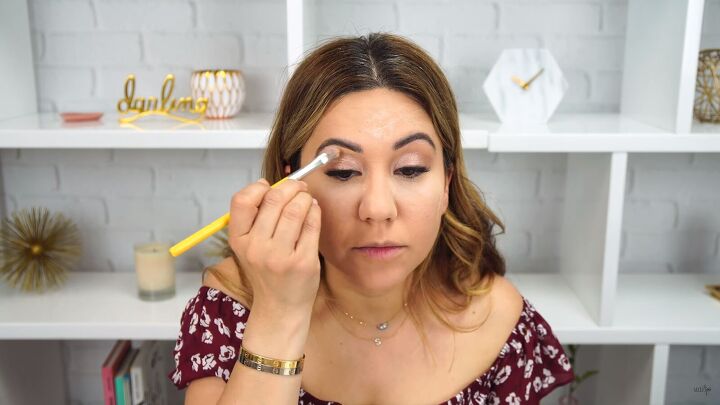 how to do simple everyday makeup you can take from day to night, Applying concealer under the brows