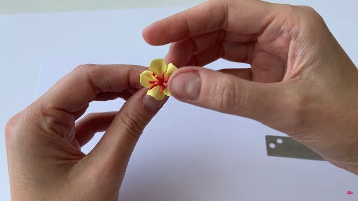 how to make a flower out of polymer clay part 4 flower with stamen, Twisting the stem
