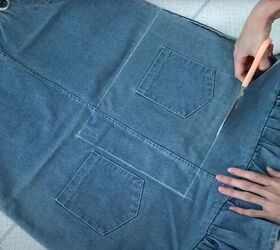 how to make a cute diy denim clutch bag out of an old jean dress, Deconstruct an old denim dress