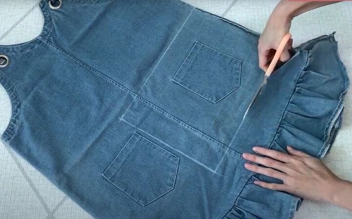 how to make a cute diy denim clutch bag out of an old jean dress, Deconstruct an old denim dress