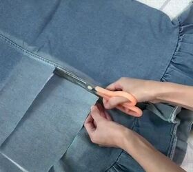 how to make a cute diy denim clutch bag out of an old jean dress, Cutting out the denim fabric