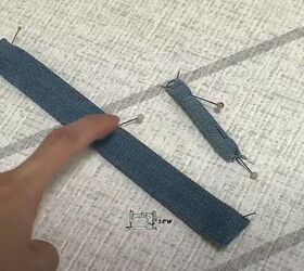 how to make a cute diy denim clutch bag out of an old jean dress, Making the strap and loop
