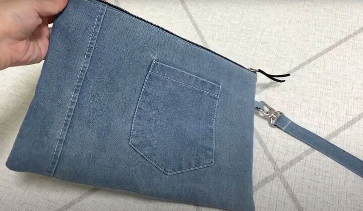 how to make a cute diy denim clutch bag out of an old jean dress, DIY denim clutch bag