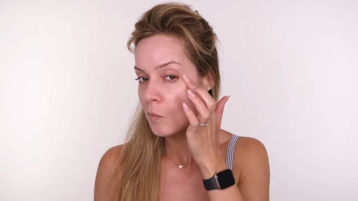 covid makeover easy beginners makeup for when you re sick, Applying highlighter to cheekbones